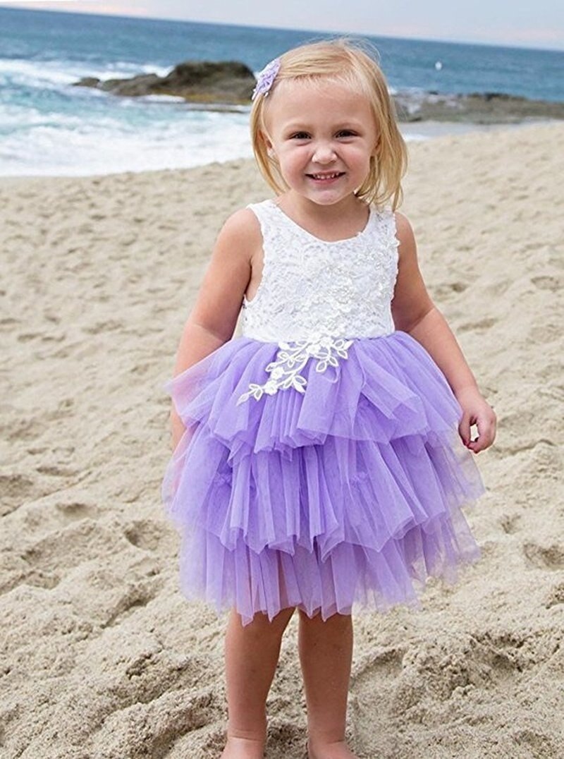 Detailed view of the back of a princess ruffle tutu dress, featuring a stylish backless design for girls.