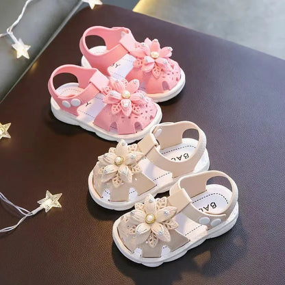 Top view of adorable pink bow summer sandals designed for baby girls.