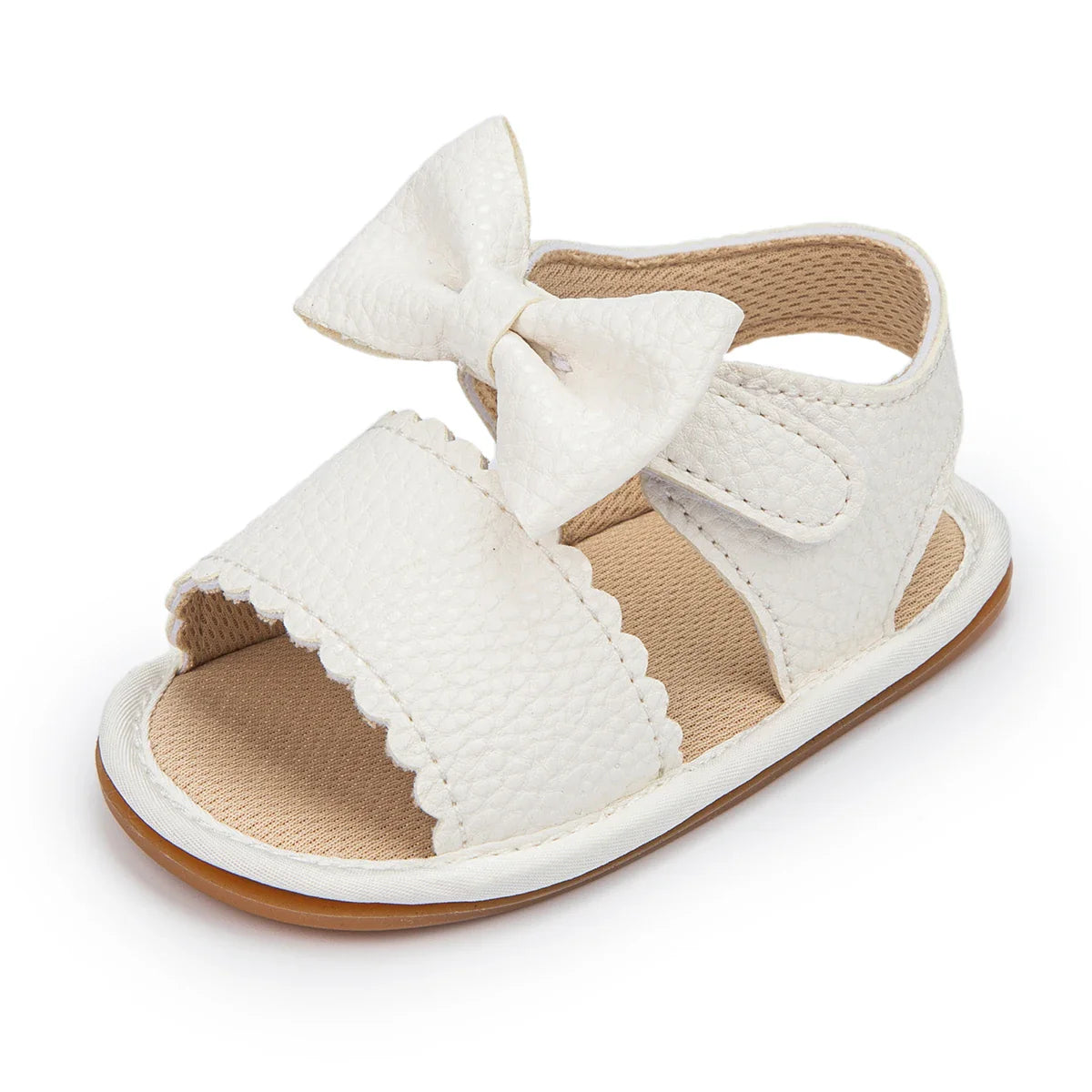 Bowknot design pink baby sandals, offering comfort and style for summer outings