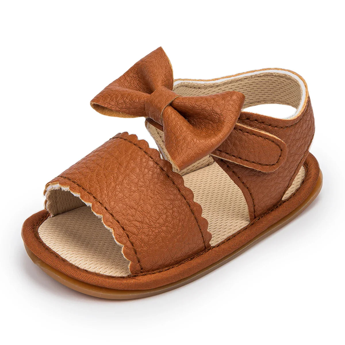 Infant white sandals with a cute bowknot, designed for new walkers, non-slip