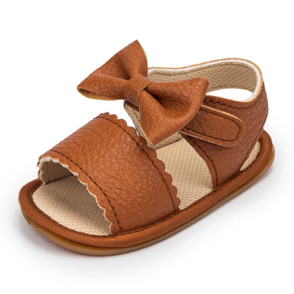 Infant white sandals with a cute bowknot, designed for new walkers, non-slip