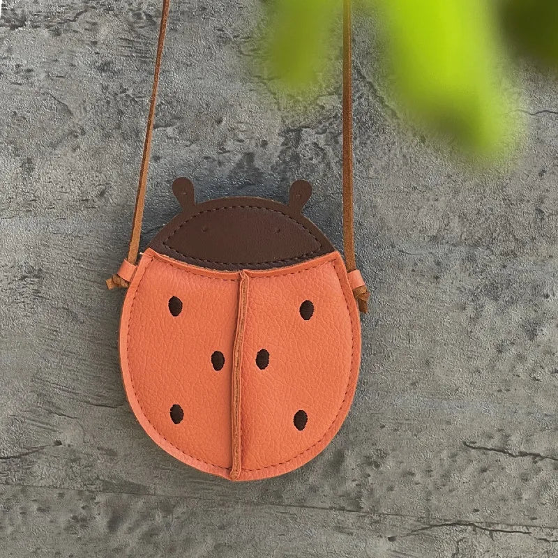 Orange cartoon lion crossbody bag for girls, adorable and practical children accessory