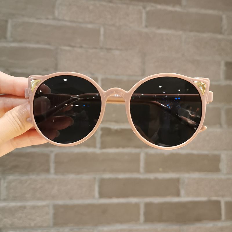 Toddler girl posing with adorable purple cat eye sunglasses, UV protection, cute children fashion