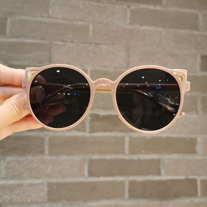 Toddler girl posing with adorable purple cat eye sunglasses, UV protection, cute children fashion