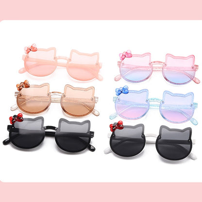 Adorable pink cat-eye sunglasses for kids, offering UV protection, a stylish accessory for toddlers.