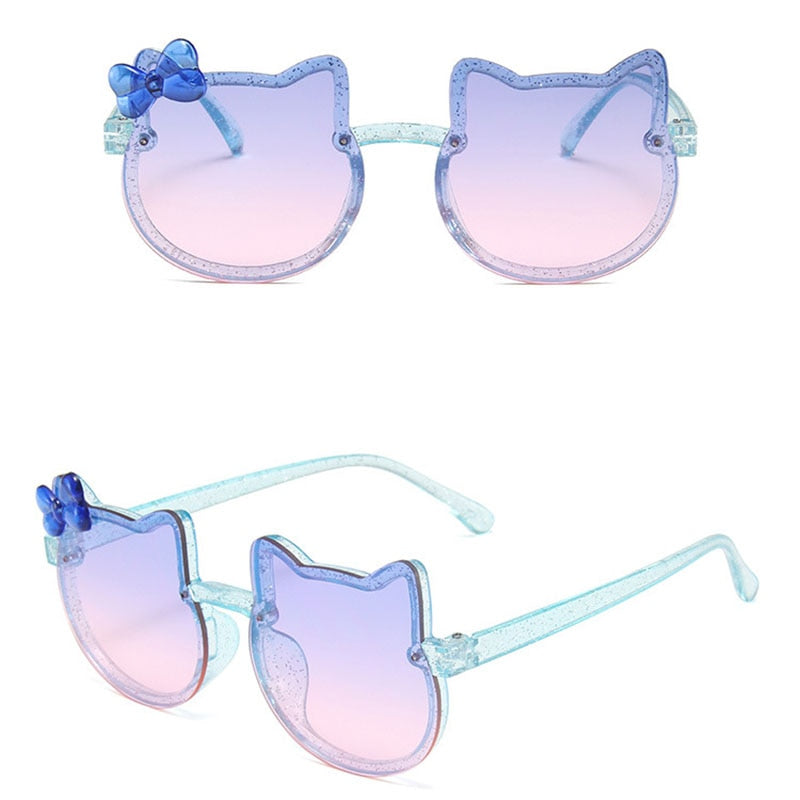 Cute yellow cat-eye kids' sunglasses with UV protection, perfect for baby accessories and outdoor play.