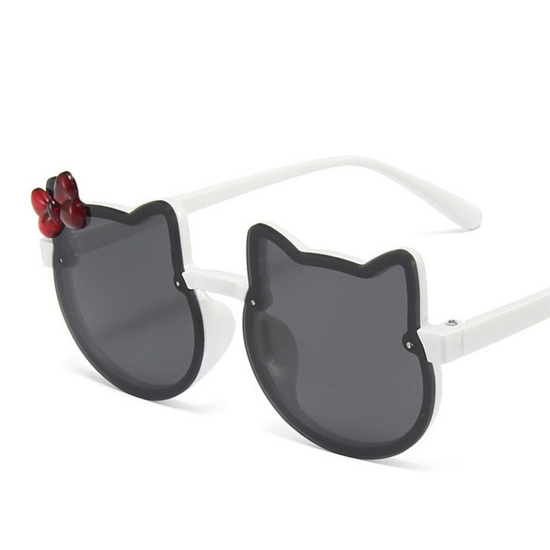 Trendy red cat-eye kids' sunglasses, a unisex fashion accessory with full UV protection for babies.
