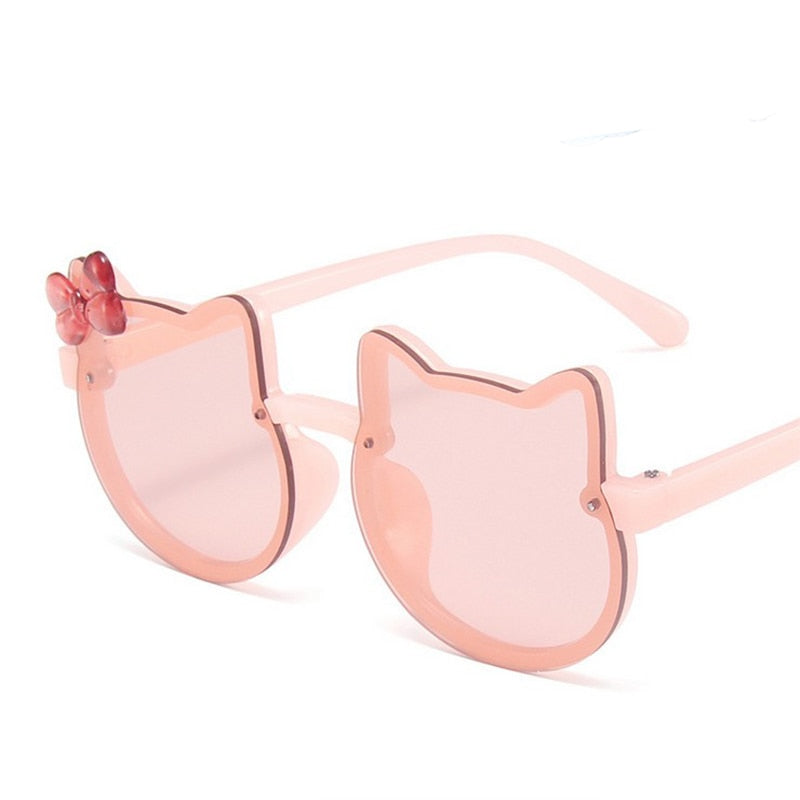 Chic black cat-eye kids' sunglasses, offering reliable UV protection, a versatile accessory for children.