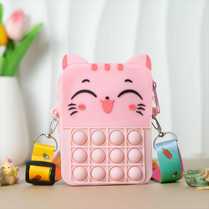 Open pink cat silicone coin purse, revealing interior space for coins.