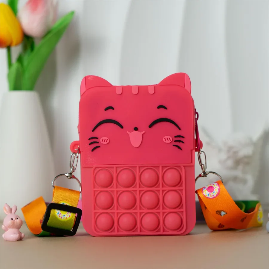 Front view of a playful green cat silicone coin purse, a cute girls' accessory.