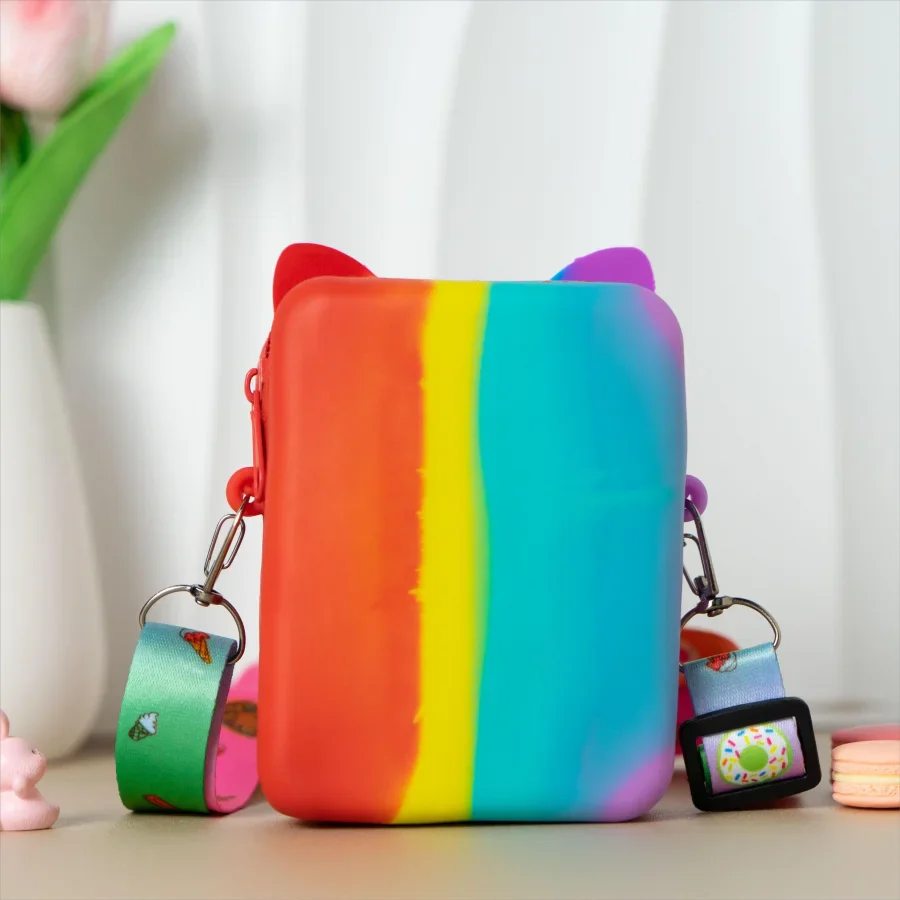 Blue cat silicone messenger bag propped up, showing its standalone shape.