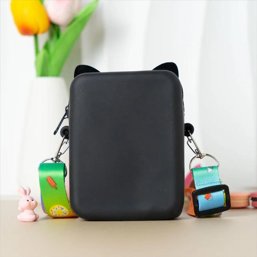 Small pink cat silicone messenger bag, perfect for carrying lunch money.