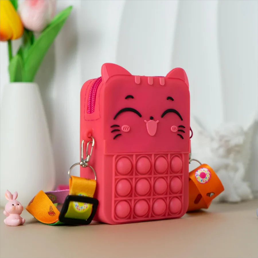 Front view of a green cat silicone coin purse, showing the secure fastener.