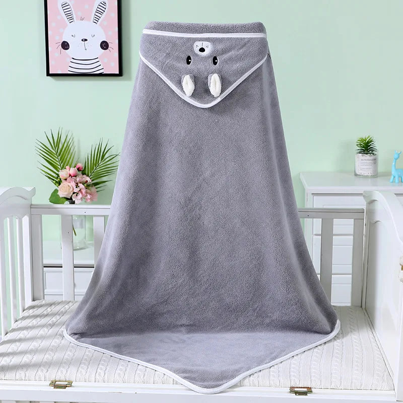 Charming brown bear hooded bath towel, super soft fleece for quick drying, perfect for baby's comfort and fun.