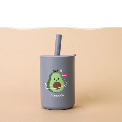 Ergonomic handle design on a baby cartoon silicone straw cup for small hands
