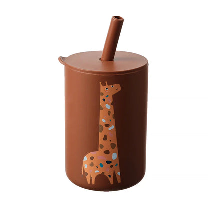 Empty green frog silicone straw cup ready for a child's drink, safe and sturdy