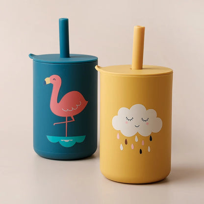 Perspective shot of multiple cartoon silicone straw cups in various colors
