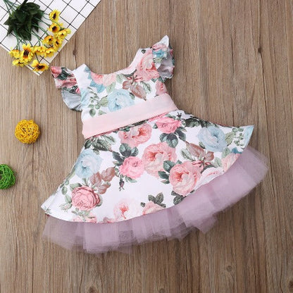 Adorable pink floral tutu dress for girls with elegant batwing sleeves, perfect for parties.