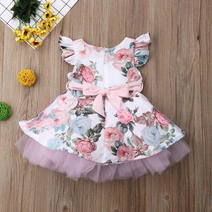 Girls' bohemian pink flower tutu dress featuring comfortable batwing sleeves for special occasions.