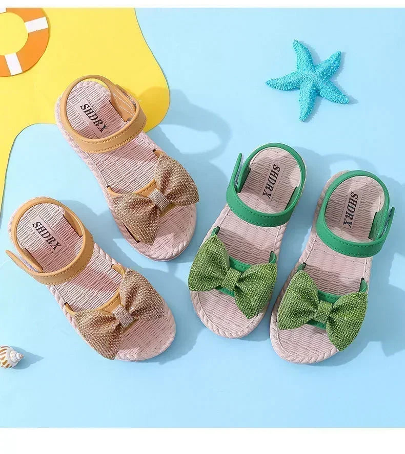 Quick-dry pink bow sandals for girls, perfect for splash pads and beach adventures