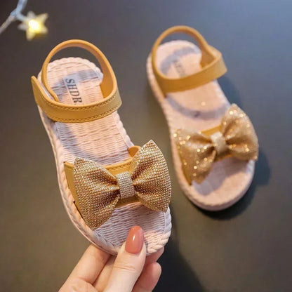 Stylish yellow girls' bow sandals, non-slip summer footwear for active kids