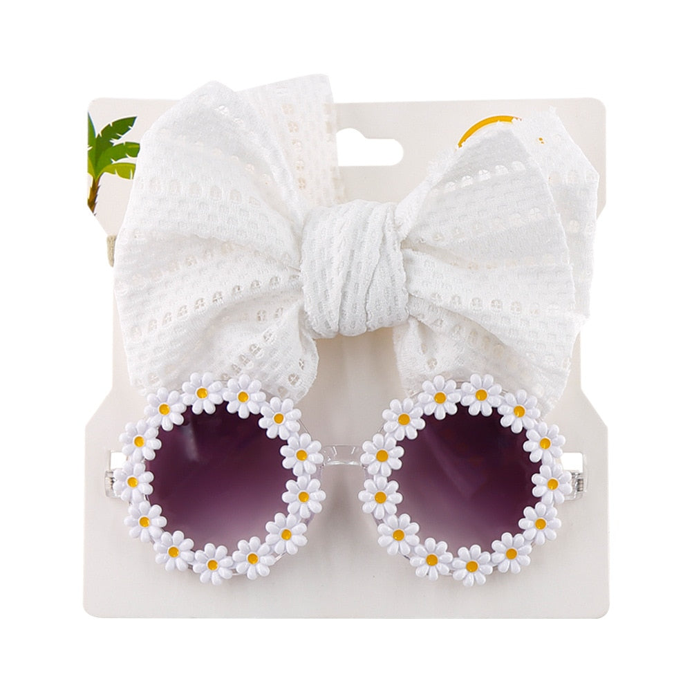 Vibrant orange children's eyewear set: UV protection sunglasses and a cute bow headband.