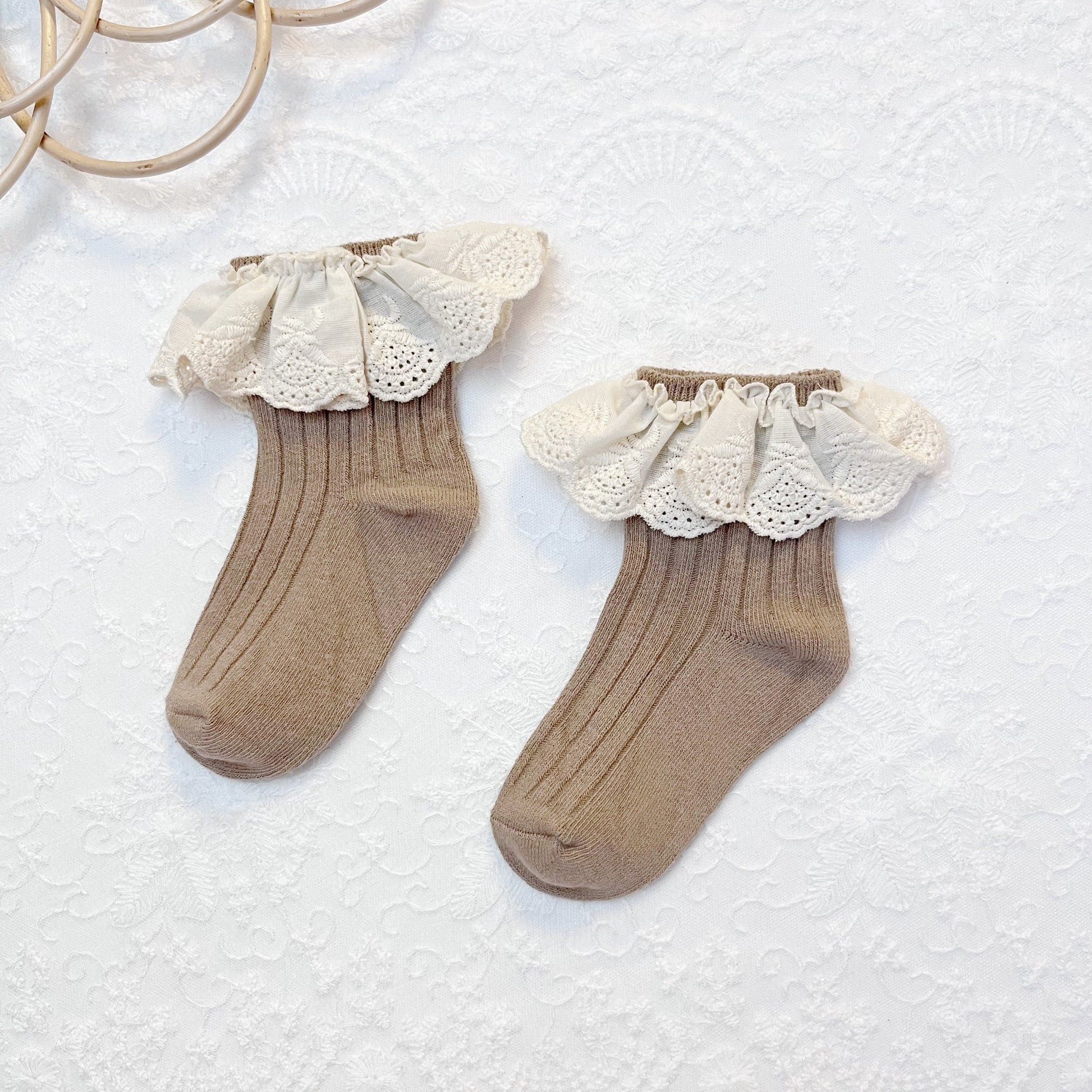 Stylish grey cotton girls' socks with elegant lace trim and a subtle flower accent