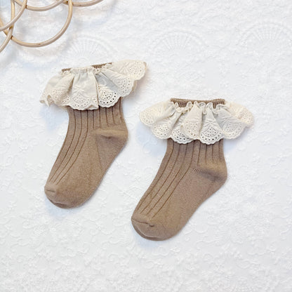 Stylish grey cotton girls' socks with elegant lace trim and a subtle flower accent