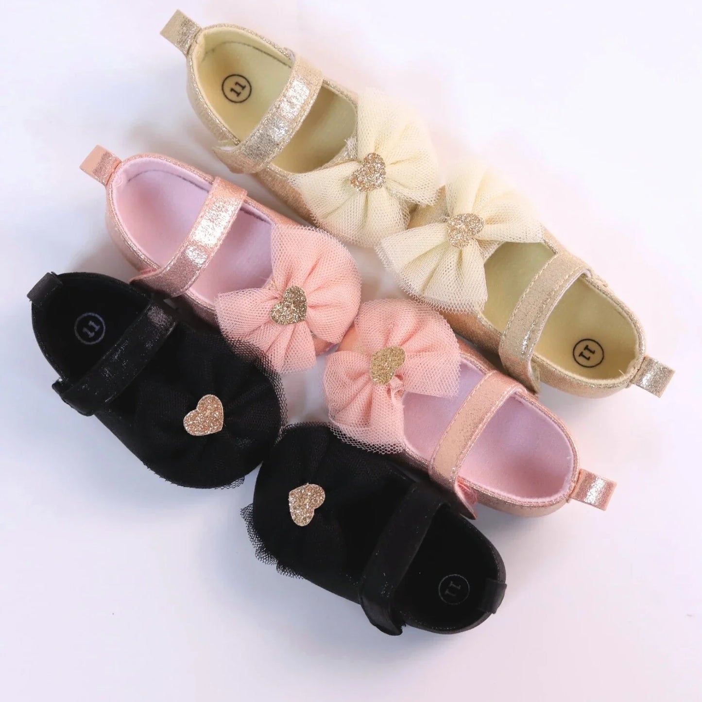Adorable pink lace princess toddler shoes for baby girls, breathable design with butterfly knot detail.