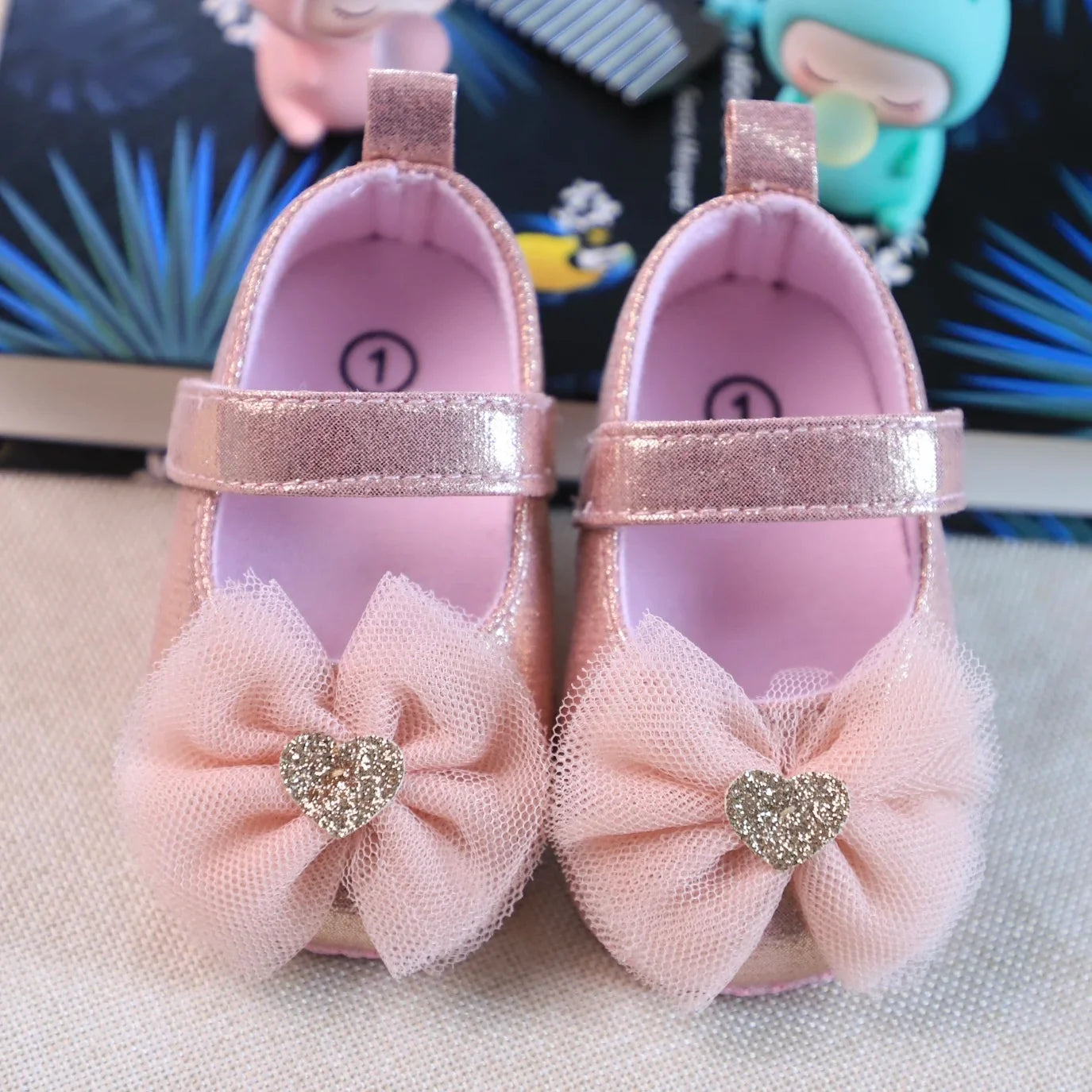 Toddler girl's pink lace princess shoes, offering breathability and easy on-off with hook and loop.