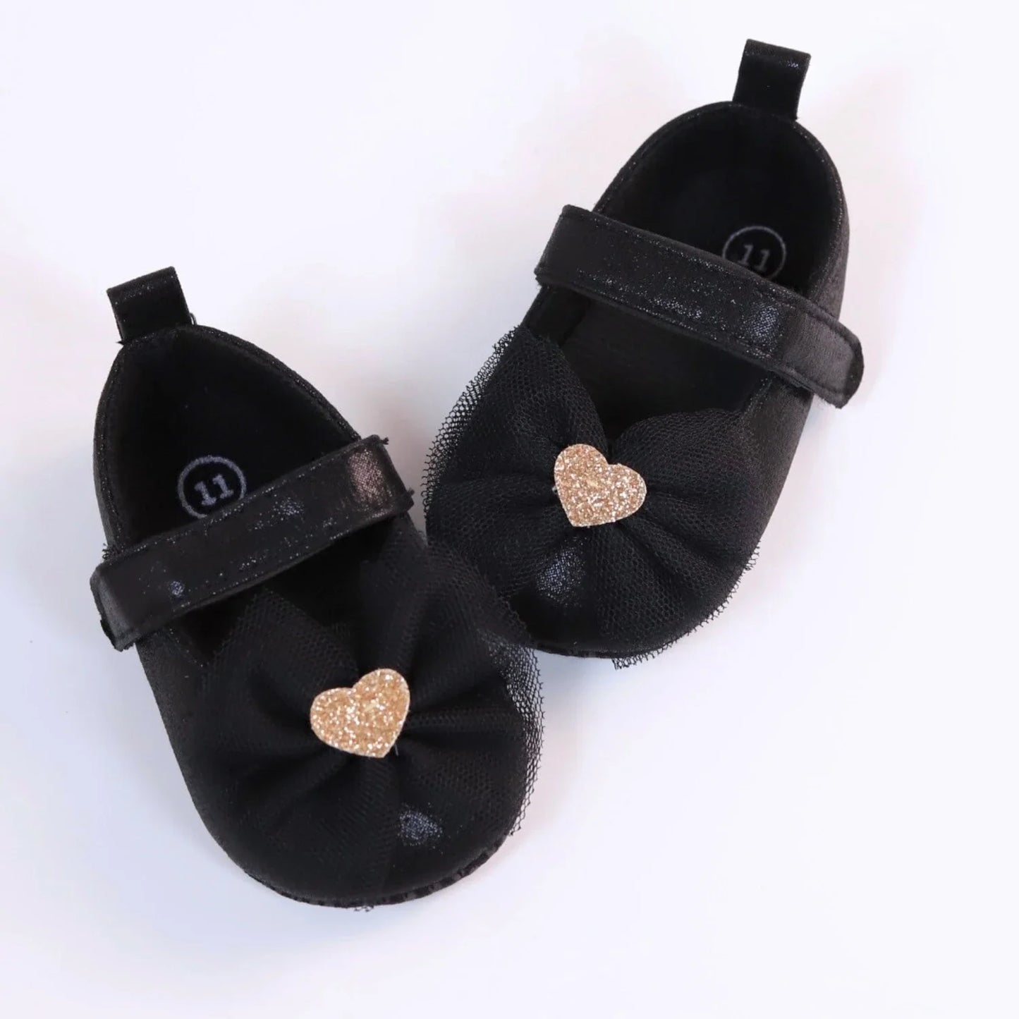 Toddler girls' breathable lace shoes in pink, ideal for first steps with a stylish butterfly knot.