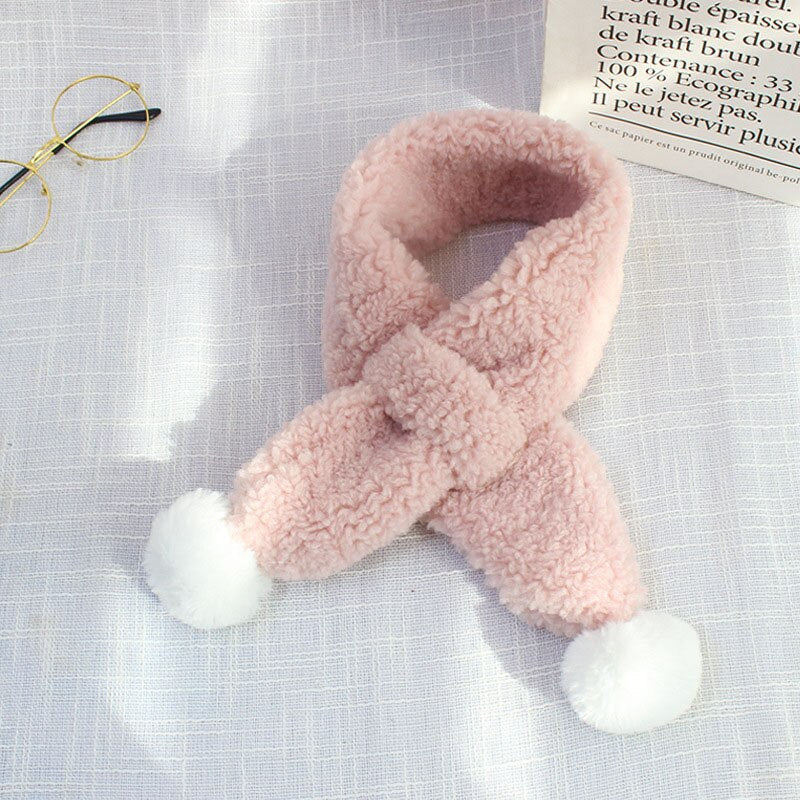 Closeup of soft, colorful candy-patterned plush scarf for kids, ideal for winter warmth and fashion.