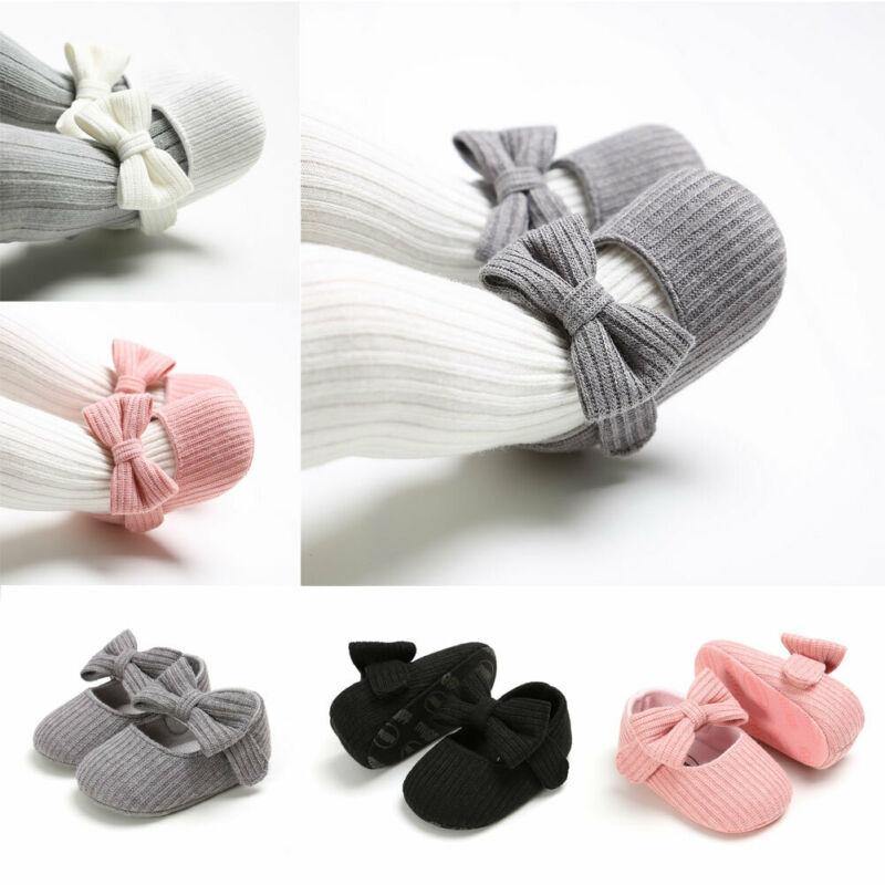 Infant girl's cotton first walker shoes with charming princess bow, anti-slip design.