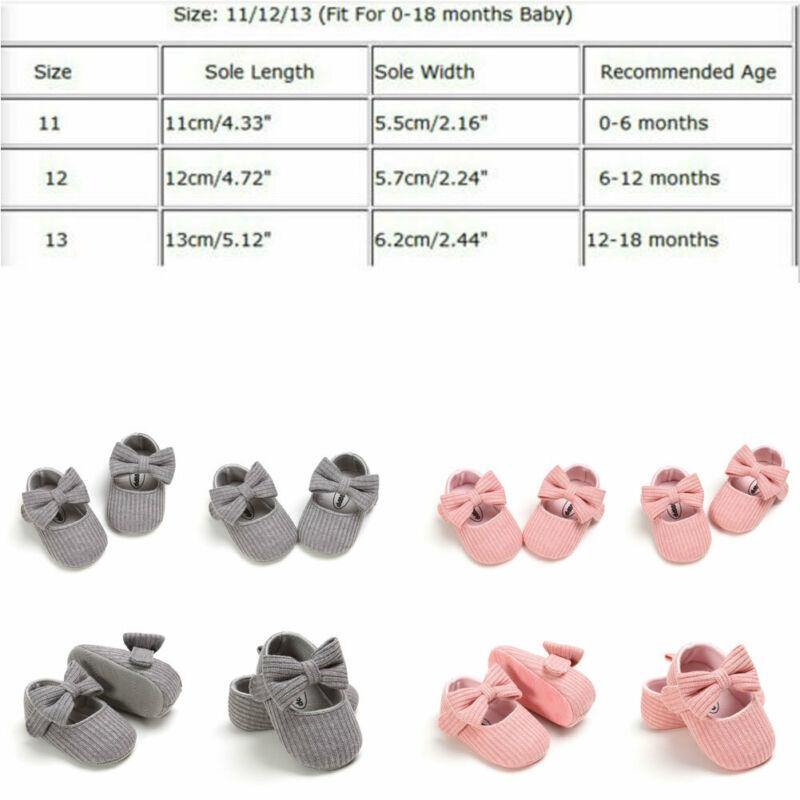 Cute baby shoes for girls with elegant bow, designed as first walkers with soft sole.