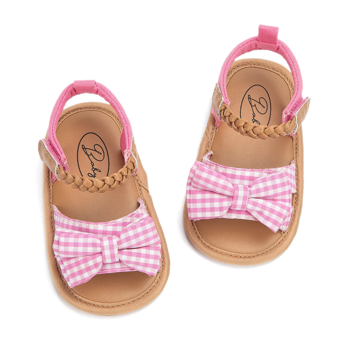 Toddler footwear: pink princess bow sandals with a secure anti-slip sole.