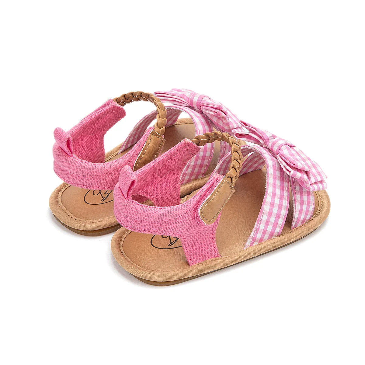 Pink sandals with a classic princess bow for baby girls, easy to wear anti-slip design.