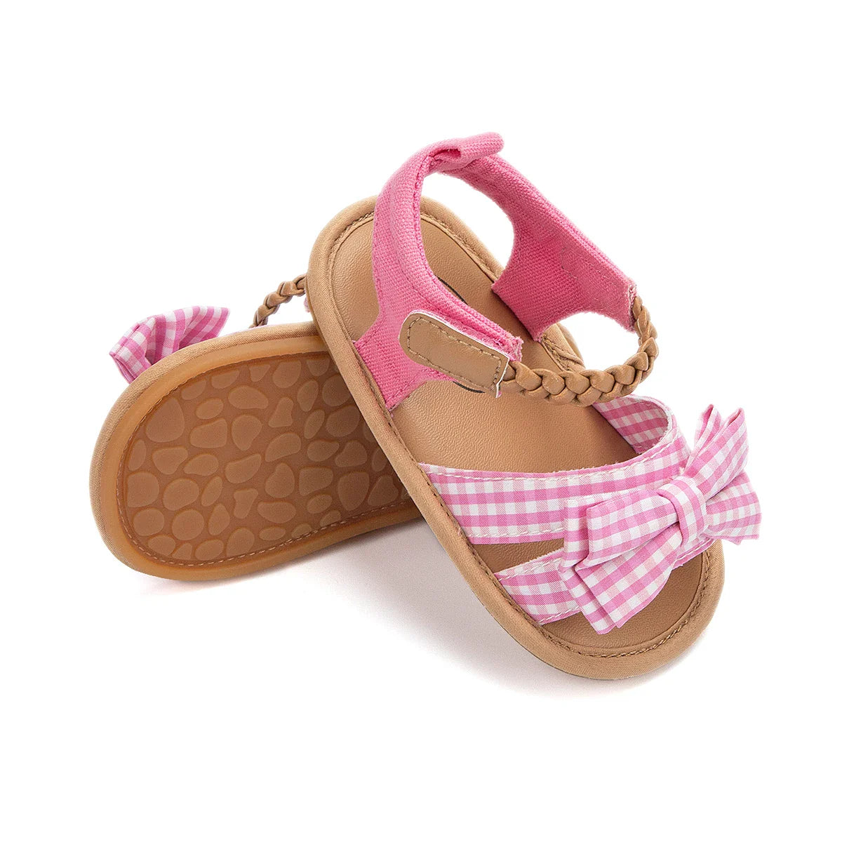 Toddler girl's princess sandals with a cute pink bow, comfortable cotton fabric footwear.