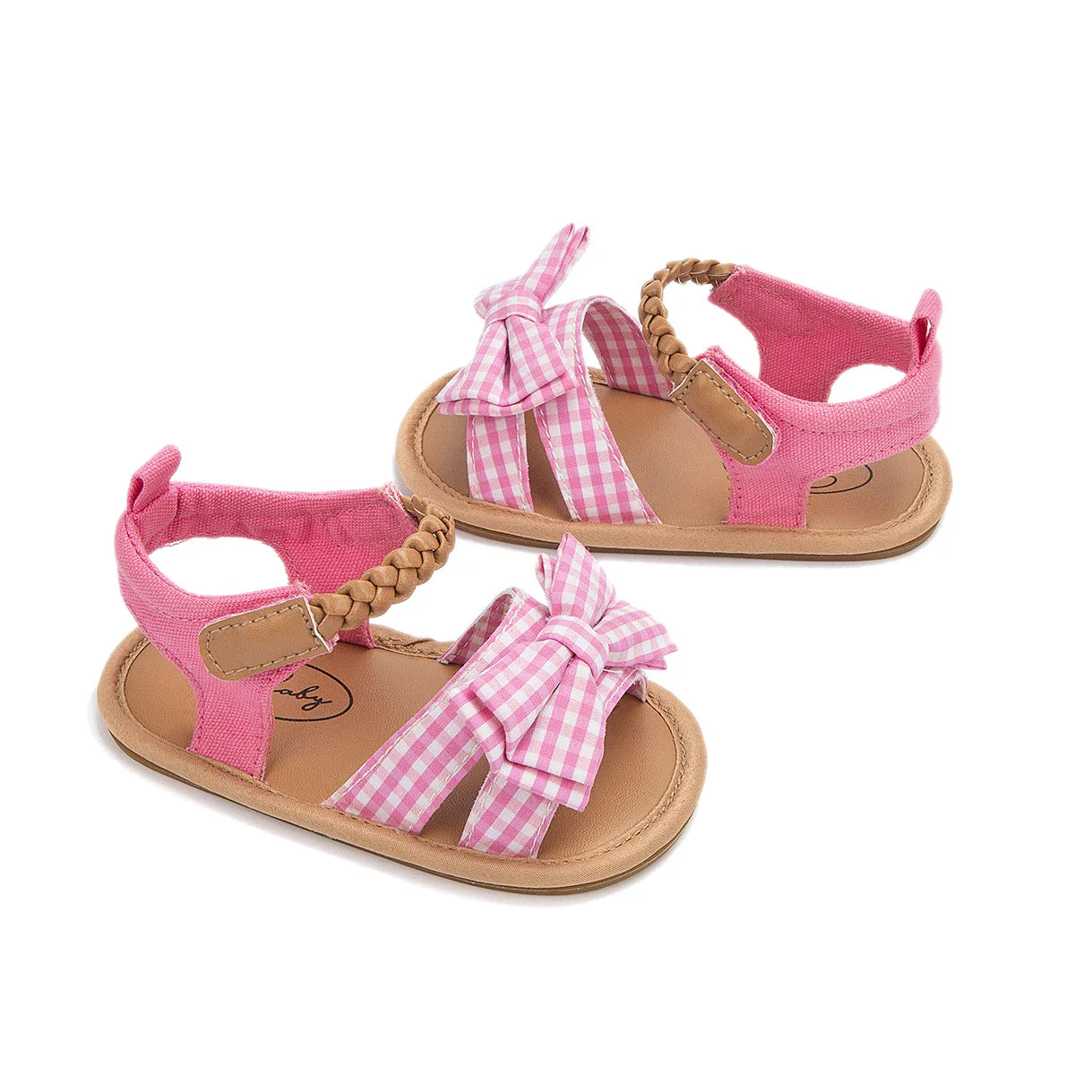Adorable pink princess bow sandals, providing comfort and style for toddlers.