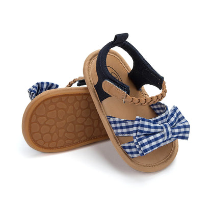 Soft cotton princess bow sandals, essential baby clothes accessory for toddlers.