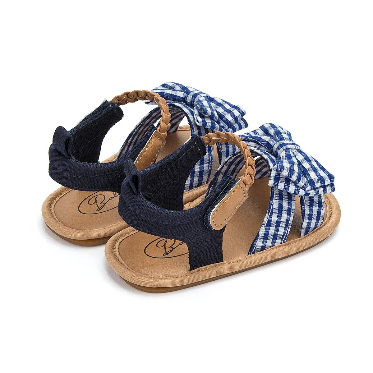 Stylish pink baby girl shoes, princess bow sandals with a non-slip outsole.