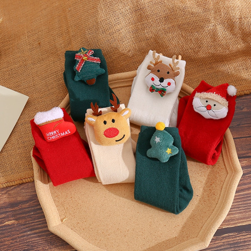 Assortment of pastel 3D animal non-slip baby socks for girls, featuring various animals.