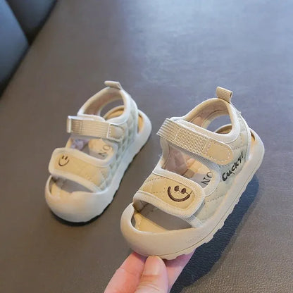 Yellow children's soft sole summer sandals, comfortable and stylish for toddlers' first steps.