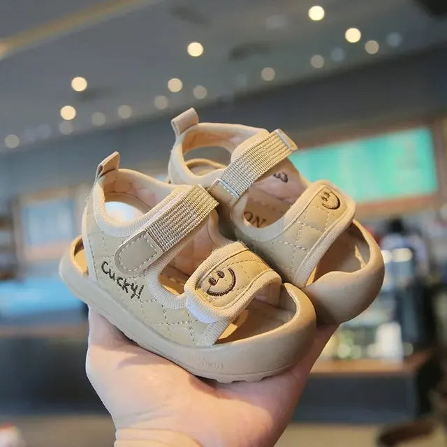 Multi-color soft sole summer sandals for babies, featuring playful design for toddler comfort.