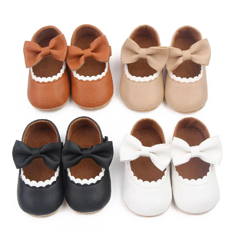 Adorable pink toddler bowknot anti-slip prewalker shoes for baby girls.