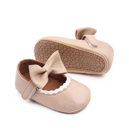 Prewalker shoes for baby girls, bowknot design, anti-slip safety features.