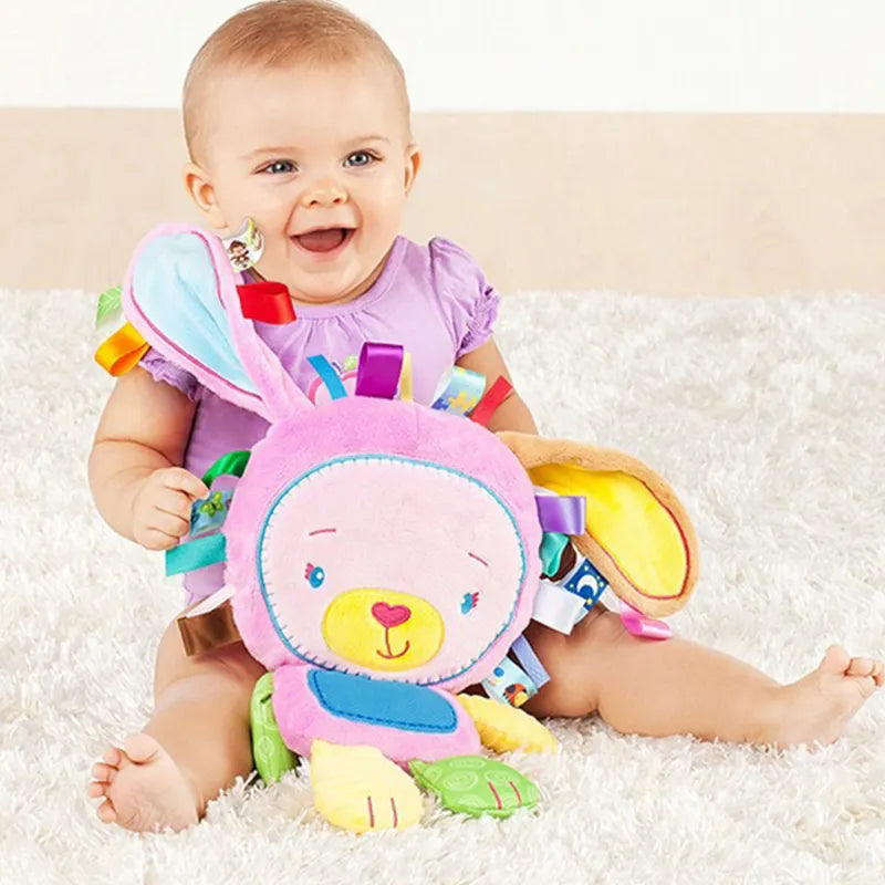 Infant sensory toy: soft lion baby bell plush for early development, ideal newborn gift.