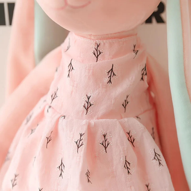 Close-up of a charming plush rabbit toy, featuring soft textures ideal for baby's sensory development.