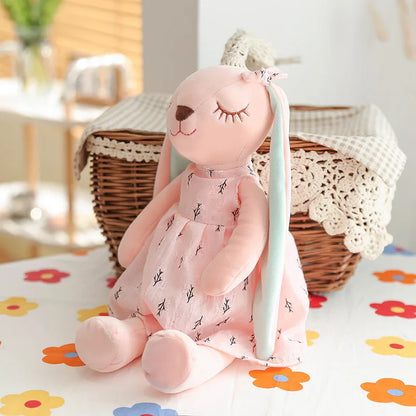 Cute plush rabbit toy with floppy ears, an ideal baby gift and comfort toy for young children.