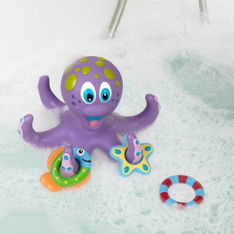Set of soft rings being tossed onto a cute purple octopus bath toy for toddlers