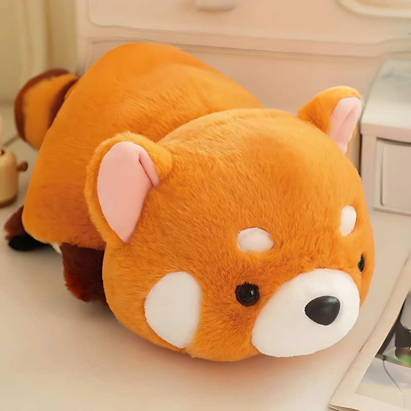 Reversible animal plush toy on a bed, showcasing cozy and soft material, great for children's gifts